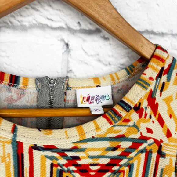 LuLaRoe Amelia Cream Multicolor A-Line Pleated Dress Size XS - Picture 7 of 7